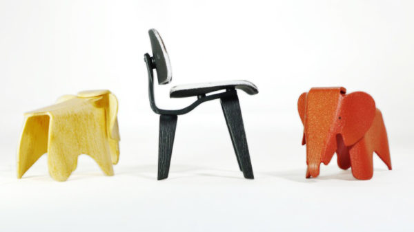 Miniature Eames Plywood Elephant: A charming brown and orange miniature replica of the iconic Eames Plywood Elephant. Miniature Eames DCW: A sleek black and white miniature replica of the renowned Eames DCW (Dining Chair Wood).