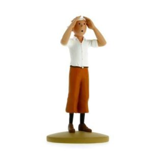 Tintin in the Desert collectible figurine depicting the iconic adventurer in desert outfit, hands shielding eyes from sun.