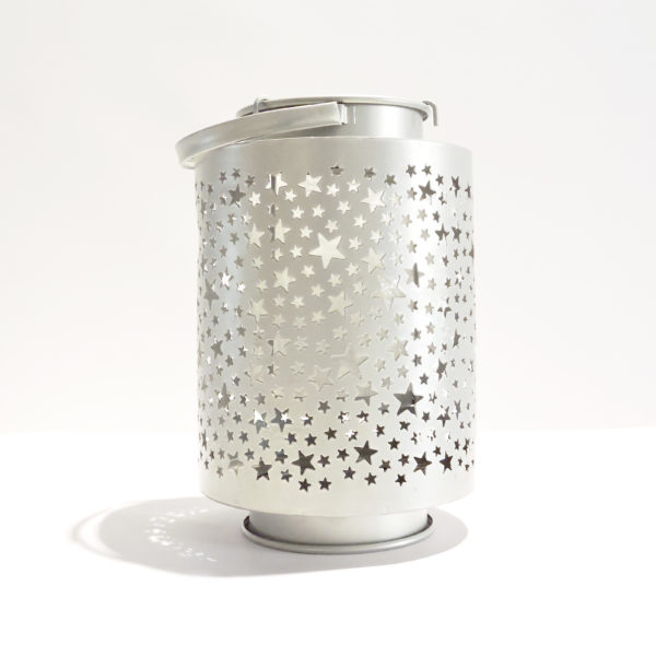 a silver finished metal starry lantern that cast a spellbinding burst of stars when lit. Bringing magic into any space.